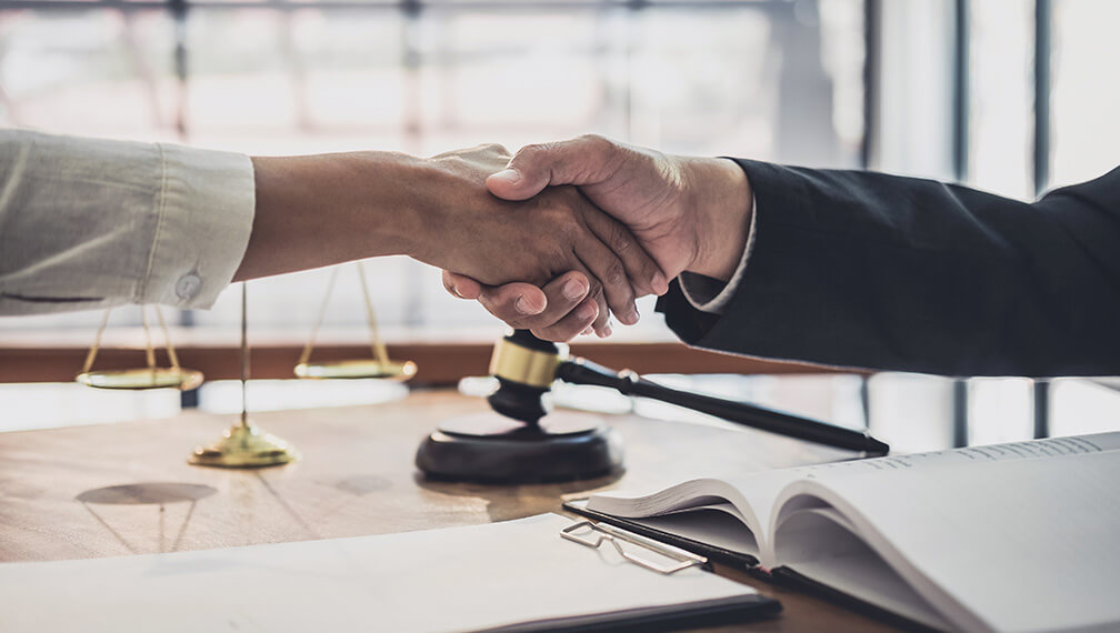 Two people shaking hands