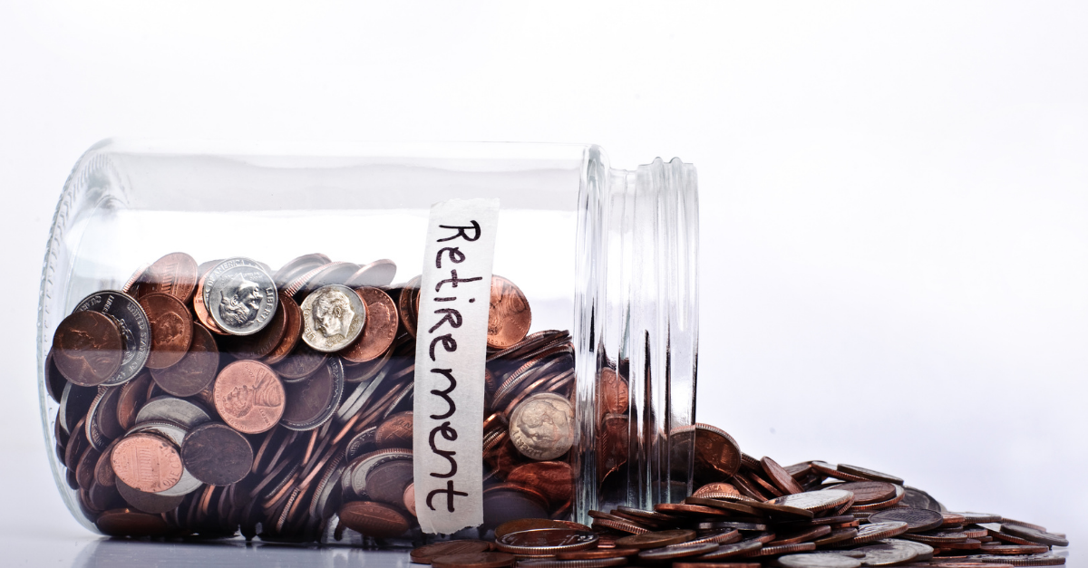 jar filled with coins labeled retirement