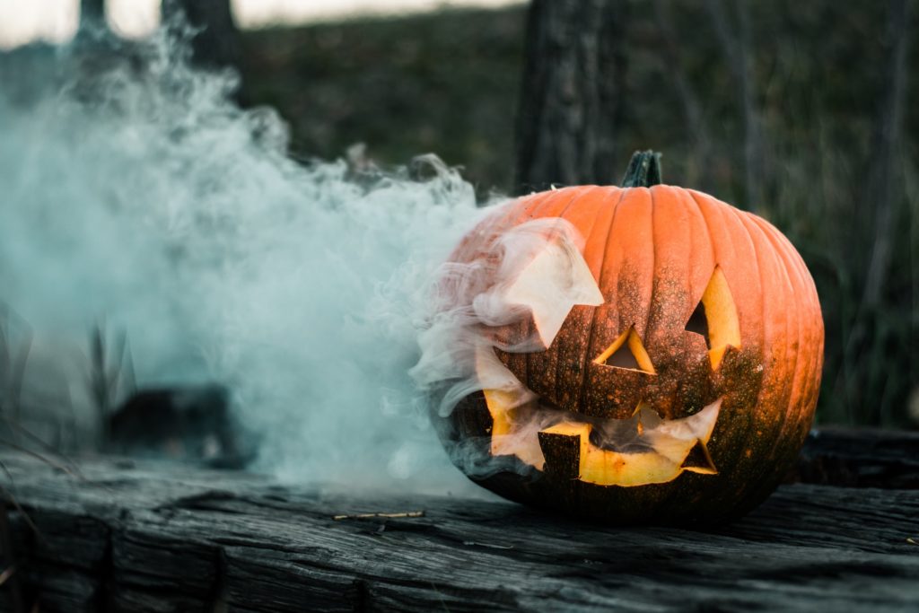 jack o lantern with green smoke coming out of it