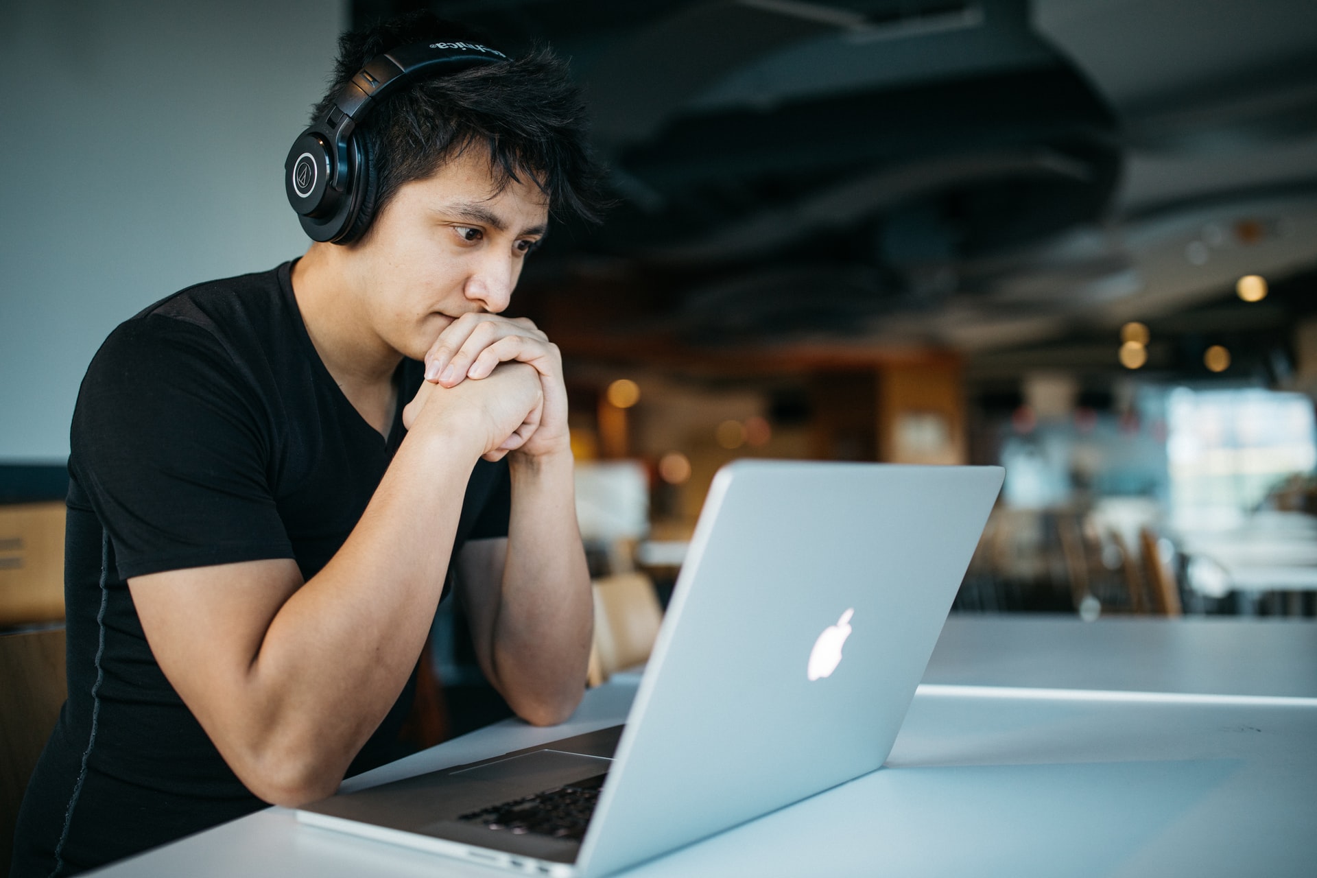 man looking at computer with concern