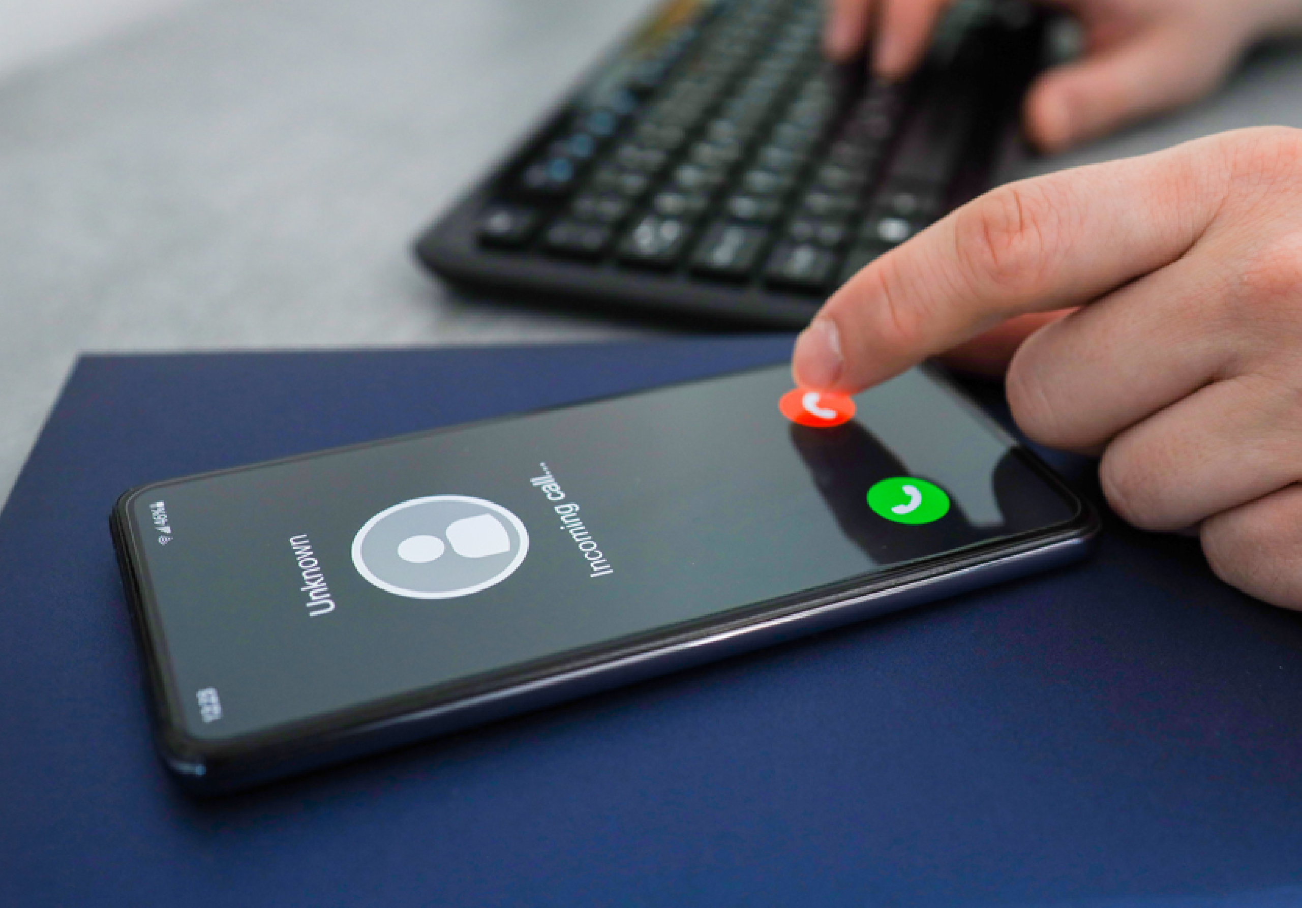 Person pressing end call to his phone