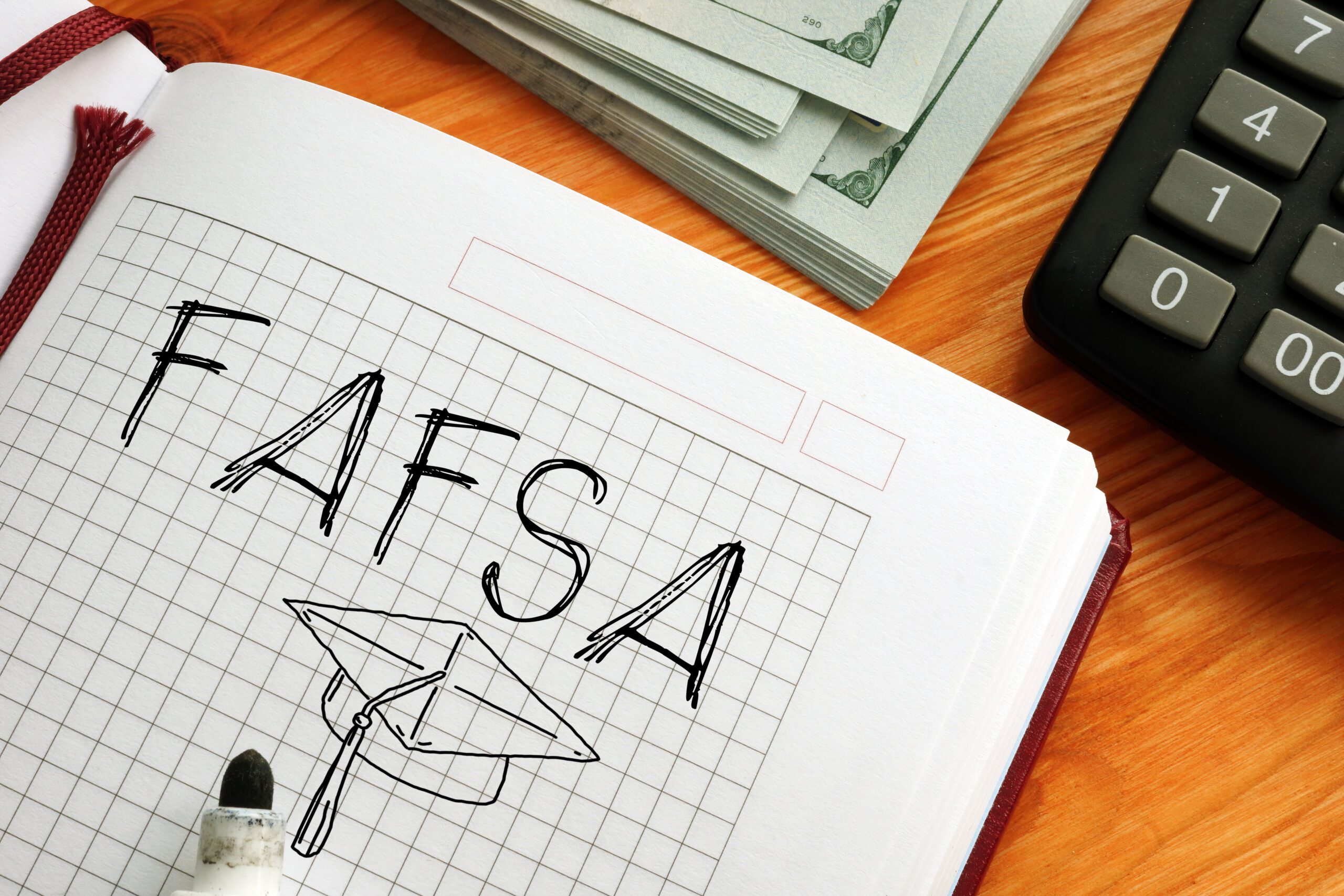 Free Appication for Federal Student Aid FAFSA is shown on the photo using the text